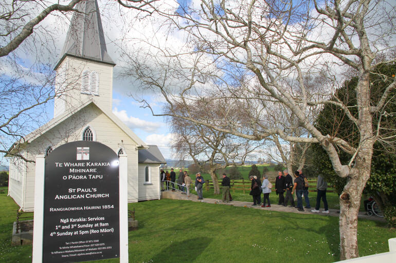 Anglo-Catholic members enter into Te Whare Karakia Mihinare o Pāora Tapu at Rangiaowhia.