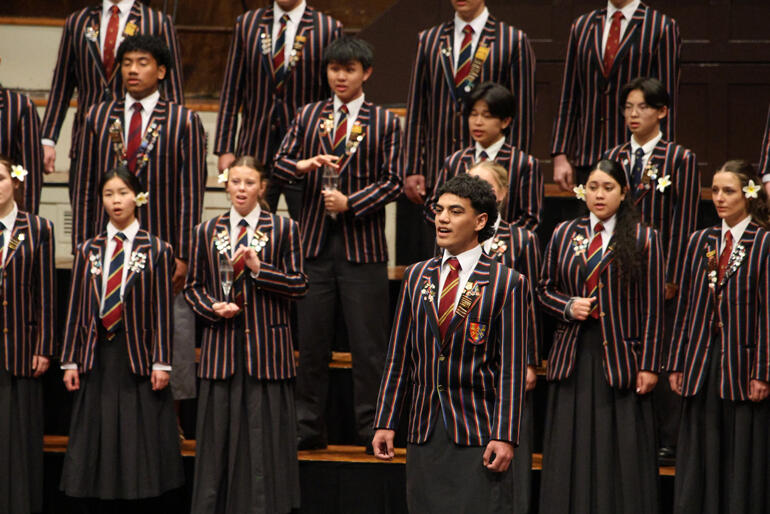 King's College soloist Kheilas Reti-Pereira (right front) leads with his 'Kappella' choir mates' backing.