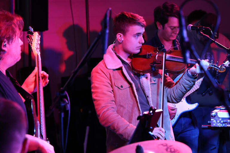 Toby McKee from St Aidan's Bryndwr supports worship music at The Abbey.