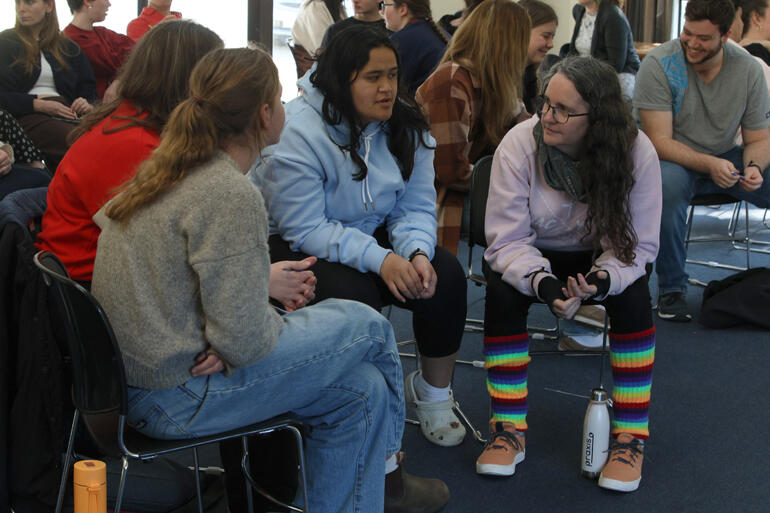 Waikanae youth pastor Hazel Nugent (in rainbow socks) listens to Anglican youth leaders' insights during the 'Working with Anxiety' workshop.