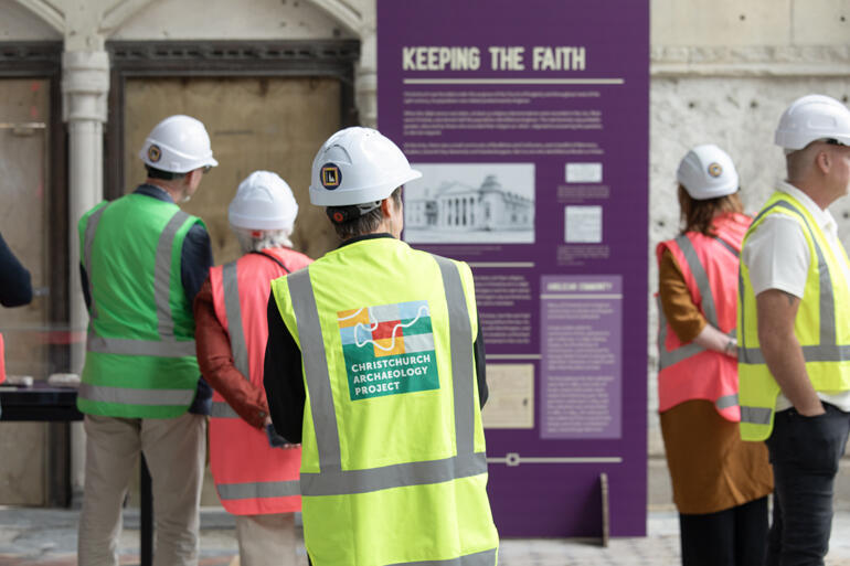 An exhibition panel focuses on 'Keeping the Faith' in Christchurch.