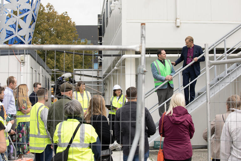 Bishop of Christchurch Peter Carrell and Dean Ben Truman open the Cathedral Square Unearthed exhibition.
