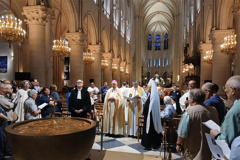 Liturgists take a worship pilgrimage around the reordered Notre Dame de Paris during the Societas Liturgica Congress.
