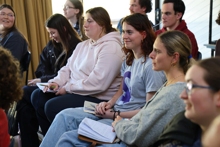 Ainsleigh Fitch (Saint MJs, Riccarton, Chch) smiles during question time in an Abbey workshop.