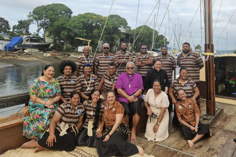 Archbishop Sione Ulu'ilakepa joins the Uto Ni Yalo crew after blessing their voyage to Honiara.